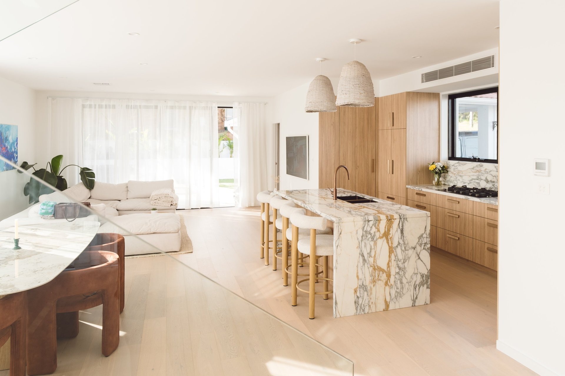Modern kitchen with island bench by ACG Built